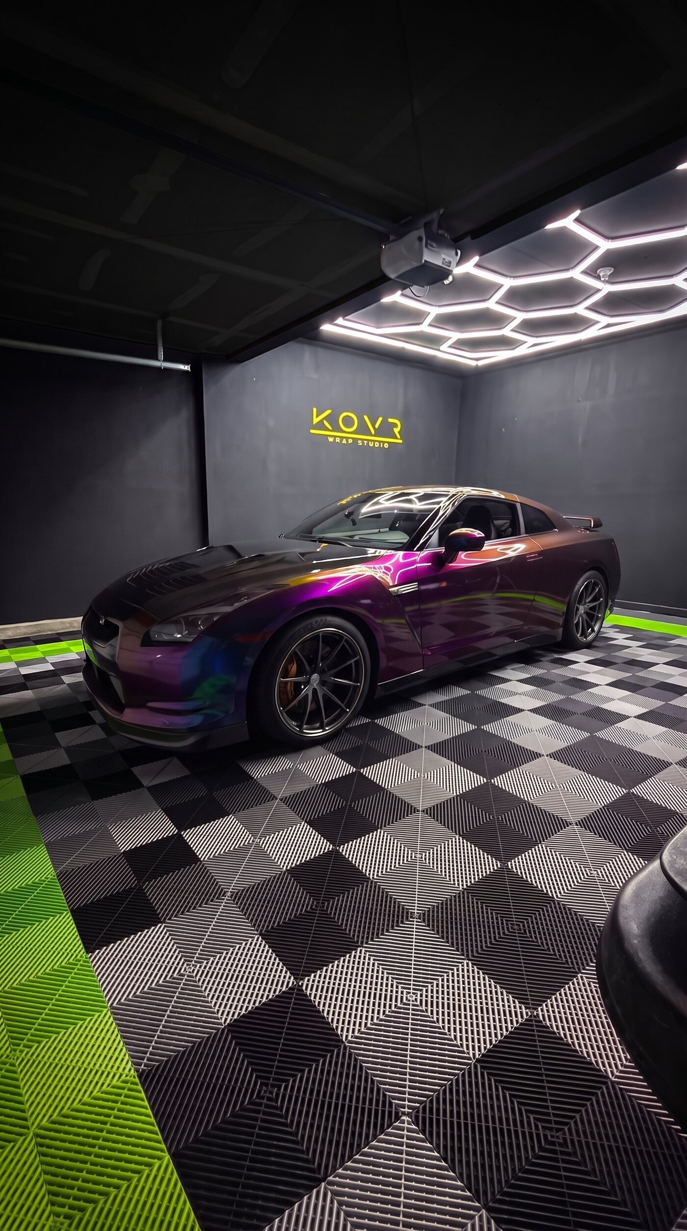 Finished Nissan GT-R in Avery Dennison Gloss Rushing Riptide, parked in the KOVR Wrap Studio