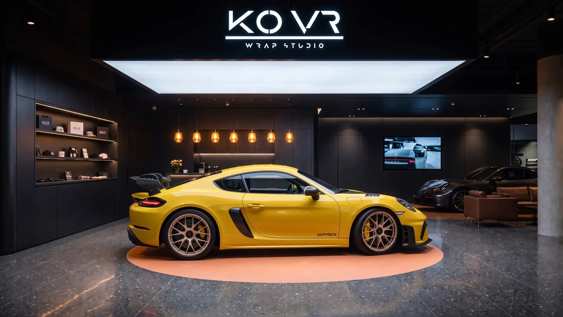 Matte yellow vehicle in the branded Kovr studio interior