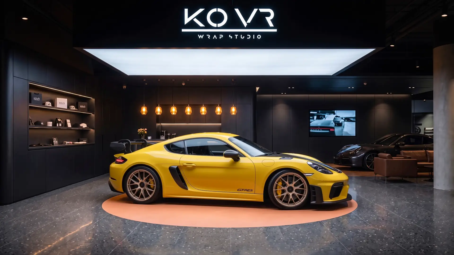 Matte yellow side profile with studio branding behind